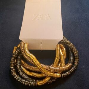 Zara Gold and Black bracelets